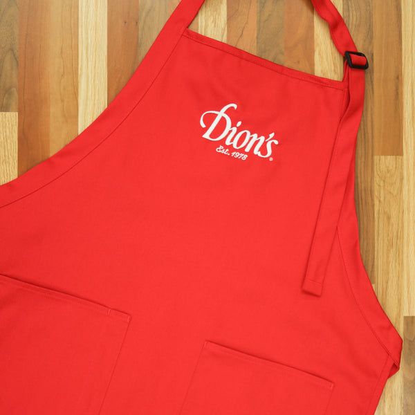 A pizza theme apron handmade with a white logo of Dion's Fan Shop's Chef Bundle.
