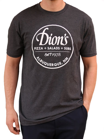 A man wearing a Dion's Fan Shop Est. 1978 Tee featuring Dion's pizza.
